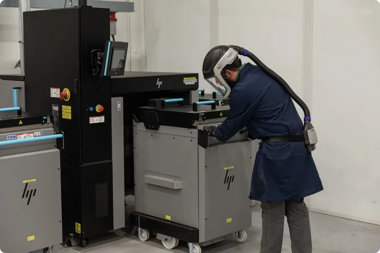 Metal Jet 3D Printing Man doing metal 3d printing