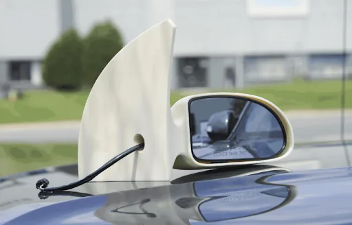 A 3D printed asa part that is a car rearview mirror