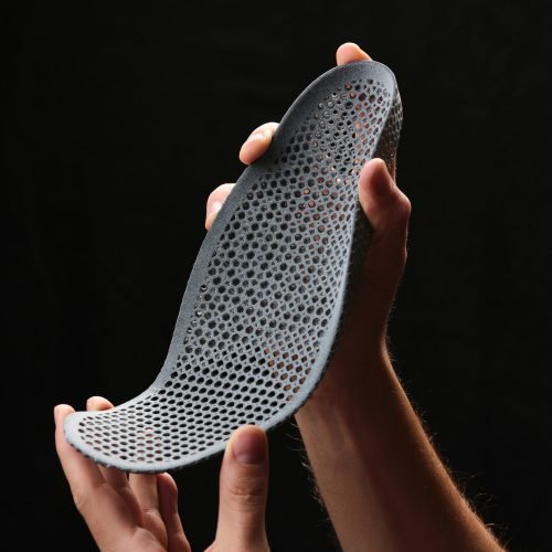 BASF TPU Orthotic Hand holding a multi jet fusion (mjf) 3d printed tpu material orthotic