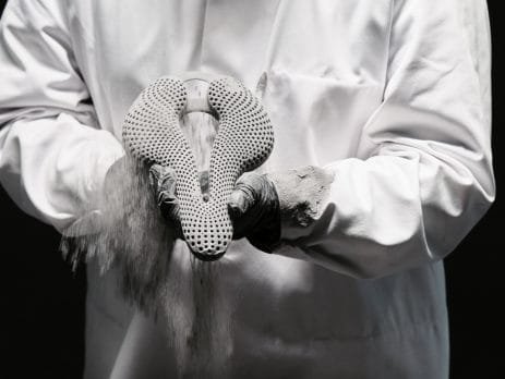 Man holding a mjf tpu 3d printed bike seat